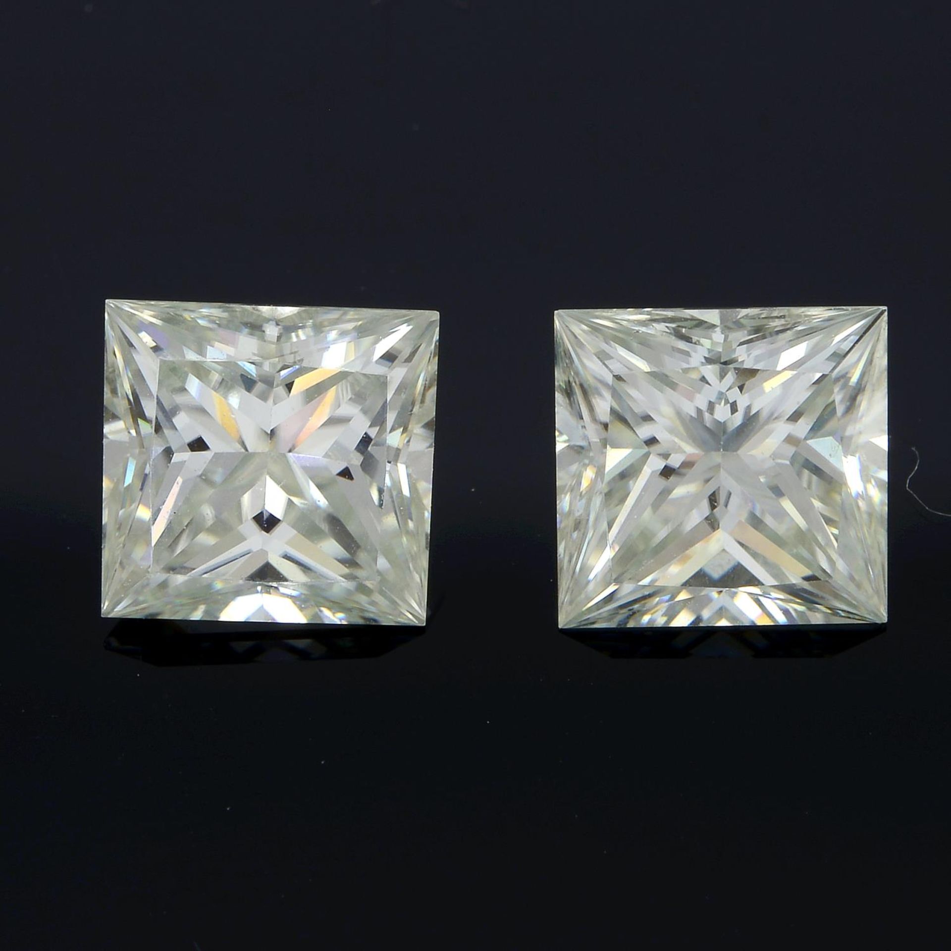 A pair of square shape synthetic moissanites.