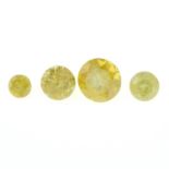 Four 'yellow' brilliant-cut diamonds.