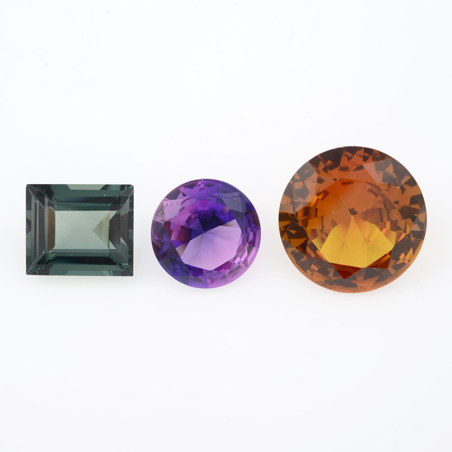 A selection of synthetic spinels and synthetic sapphires, weighing 184gms.