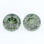 A pair of circular-shape green synthetic moissanite, total weight 6.80cts.