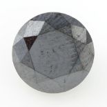 A circular shape black gemstone, weighing 3.08ct.