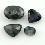 Four vari-shape green sapphires.