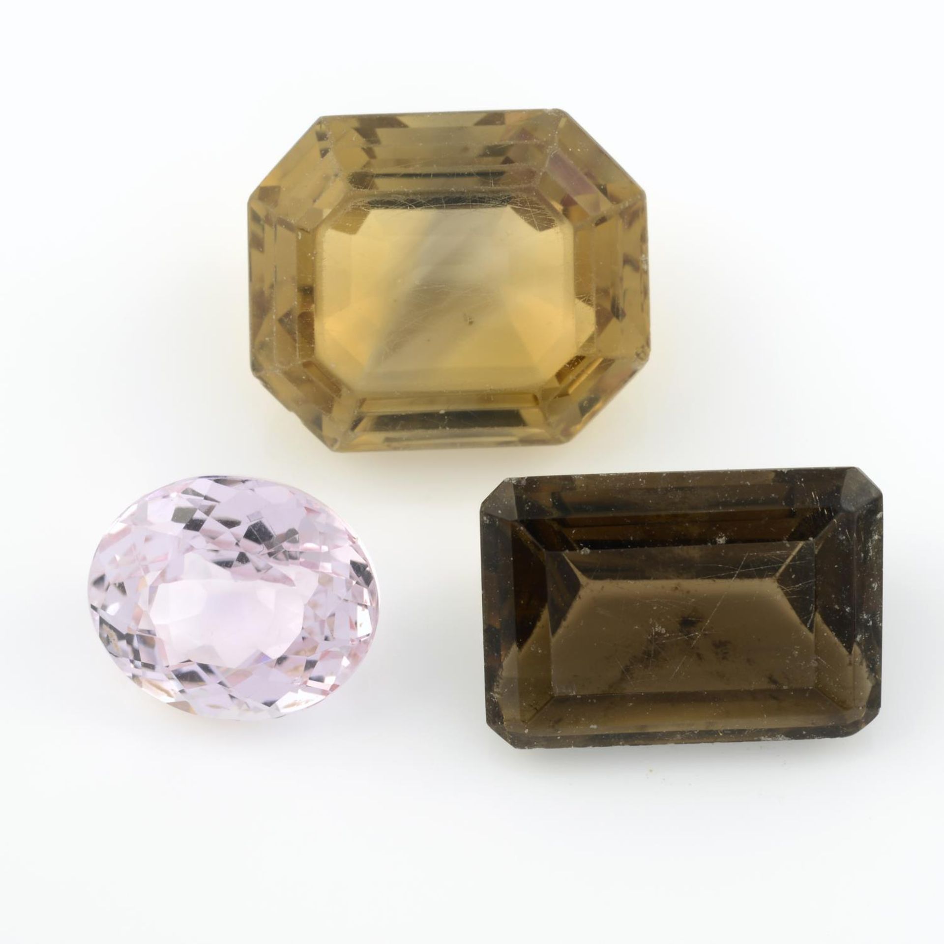 A selection of gemstones, to include predominantly smoky quartz, weighing 307gms.