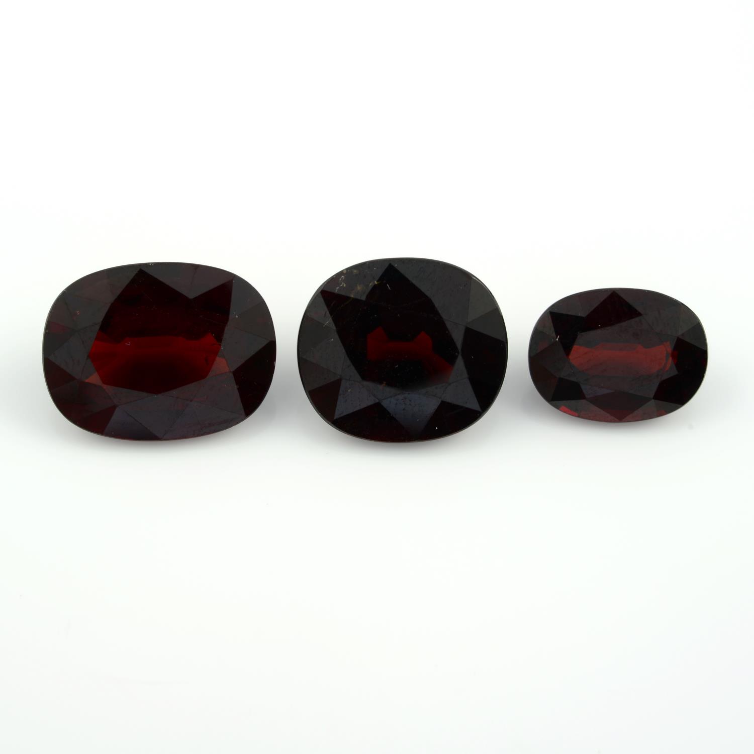 Three oval shape garnets.