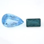 A pear shape topaz and a rectangular shape grandidierite weighing 99.7ctTopaz measuring 32.44 by