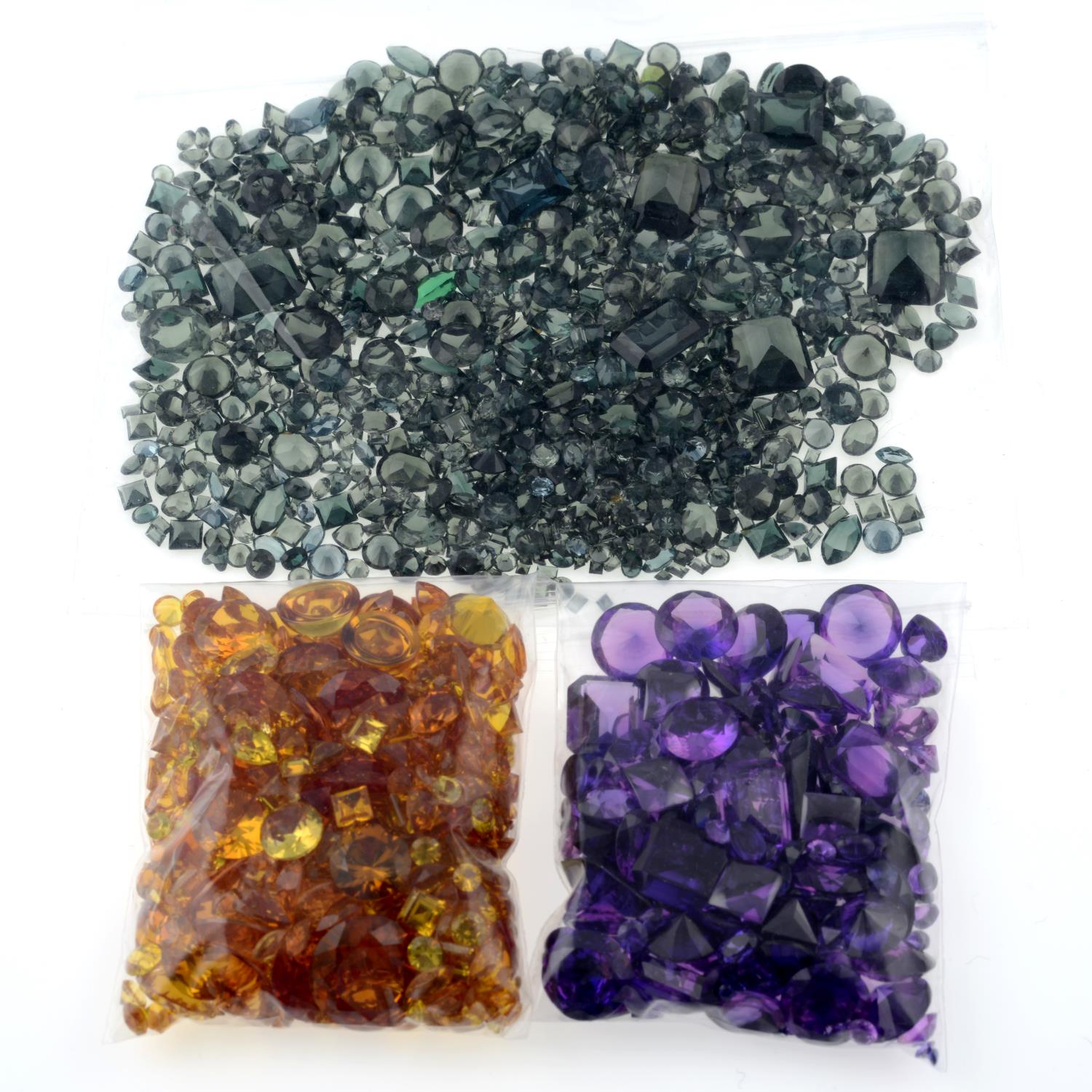 A selection of synthetic spinels and synthetic sapphires, weighing 196gms. - Image 2 of 2