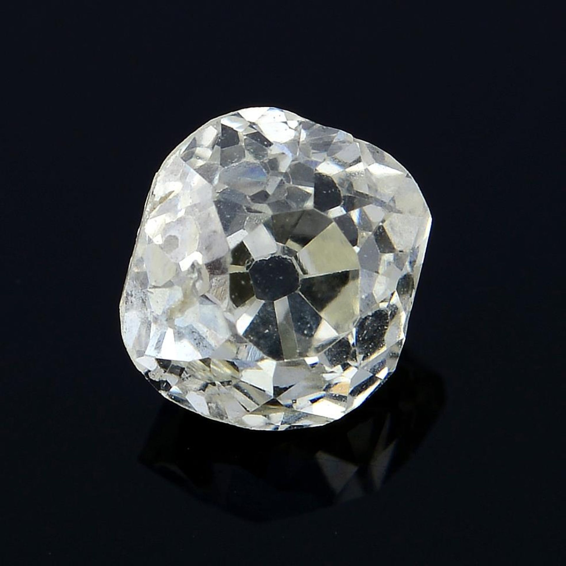 A old mine-cut diamond, weighing 0.67ct.
