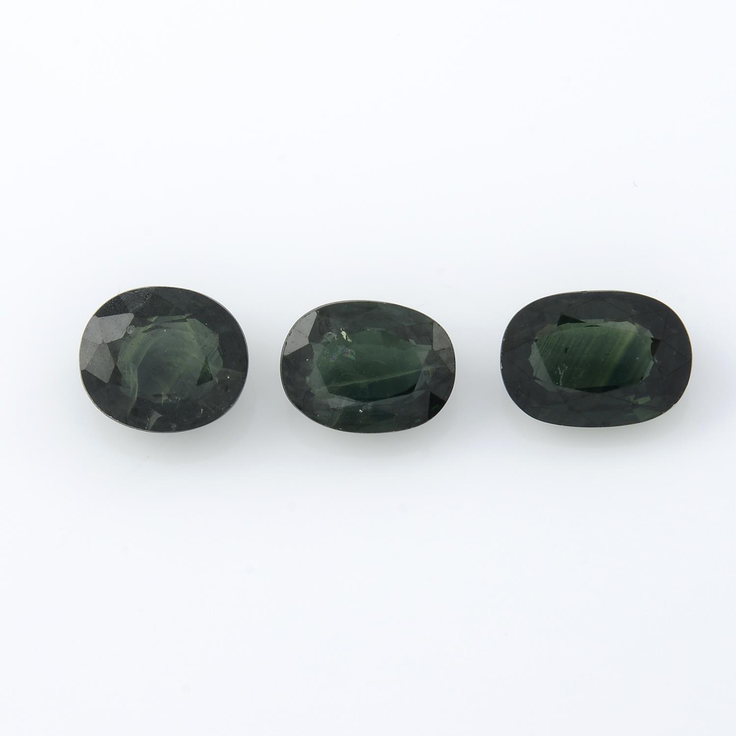 Three oval-shape green sapphires, total weight 5.75cts.