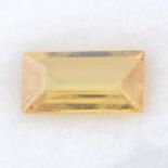 A rectangular-shape yellow sapphire.