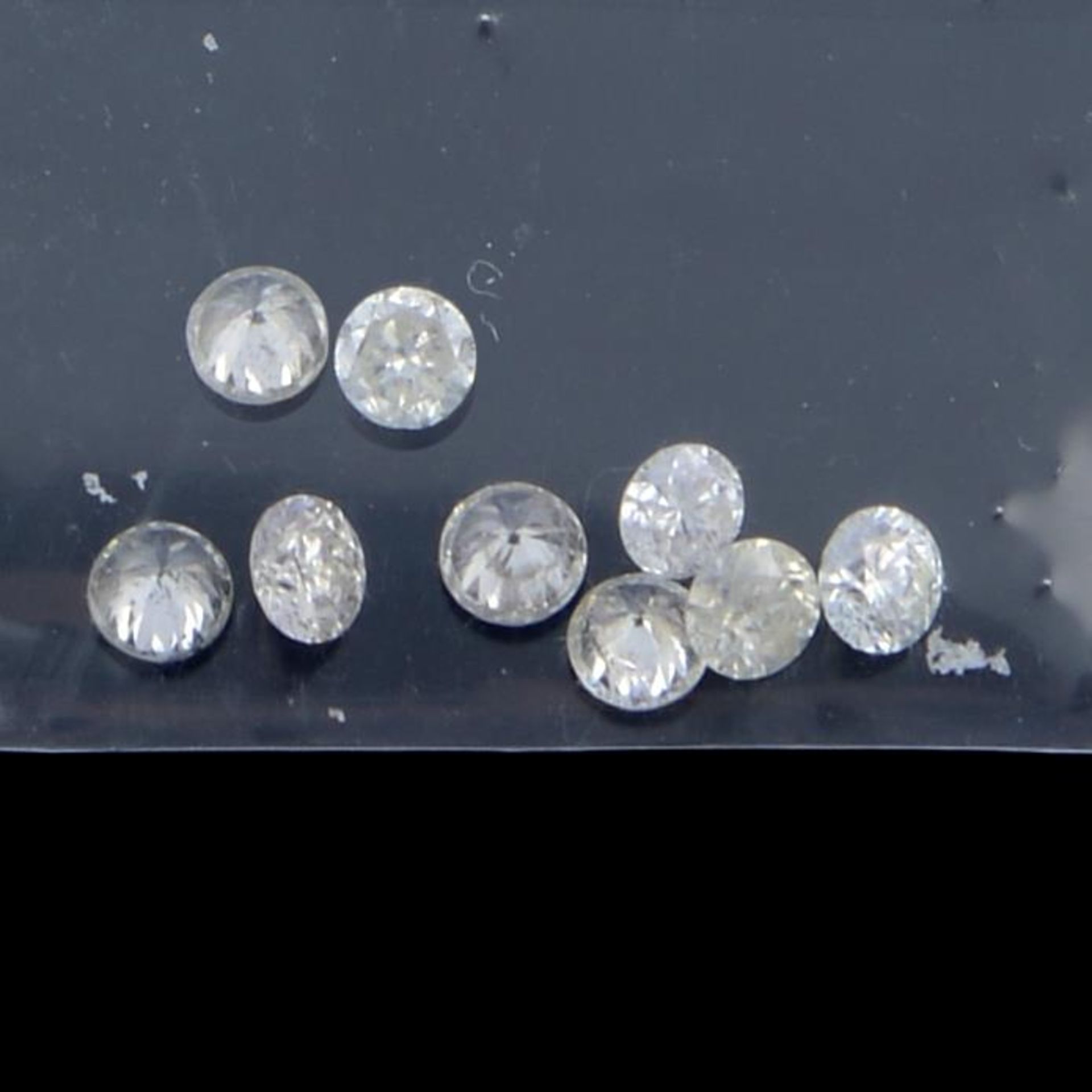 A selection of brilliant-cut diamonds, weighing 0.75ct total. - Bild 2 aus 2