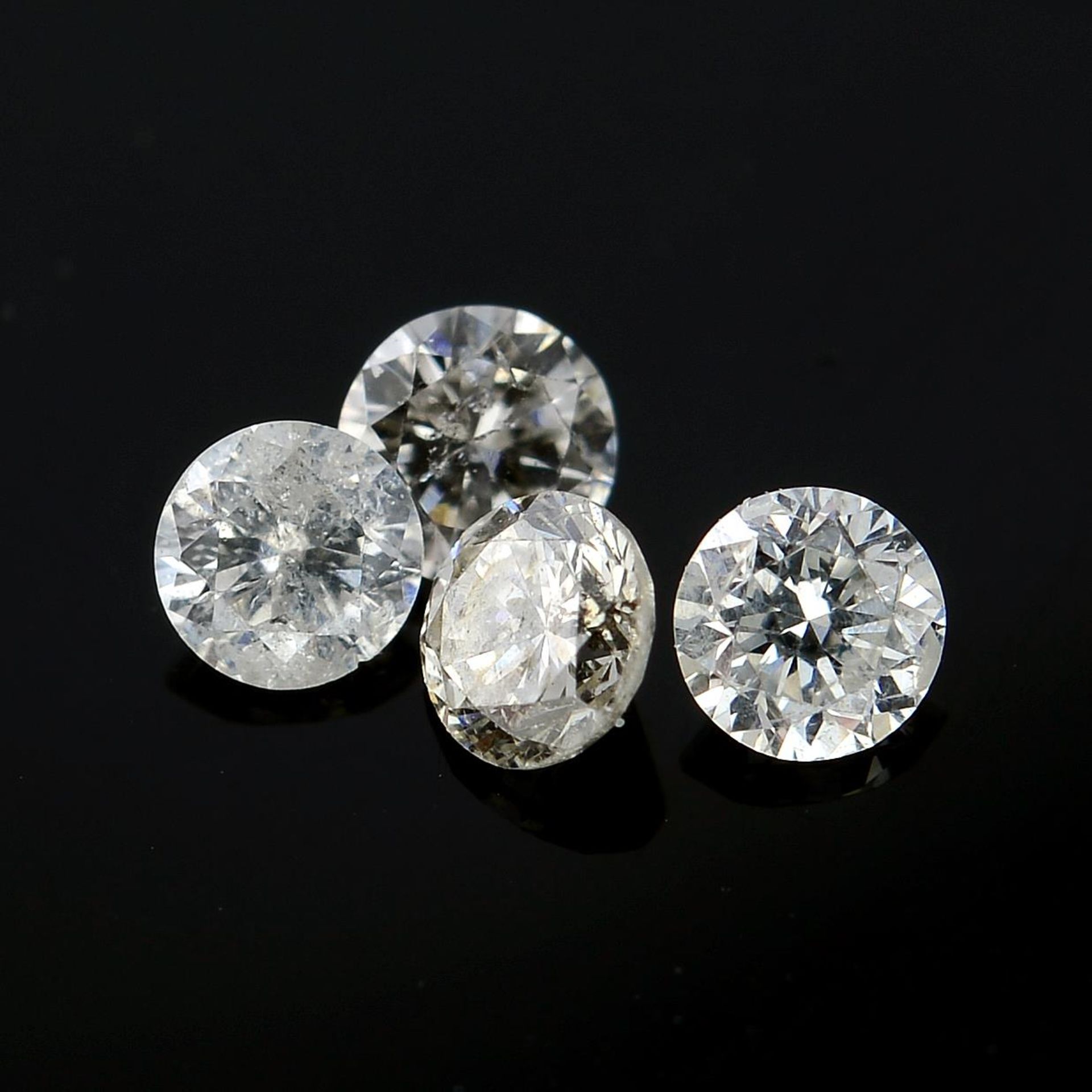 A selection of brilliant-cut diamonds, weighing 0.75ct total.