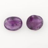 Two oval-shape pinkish purple sapphires, total weight 3.68cts.