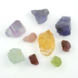 A selection of rough gemstones,