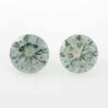 A pair of circular-shape synthetic moissanites.