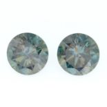 A pair of circular-shape green moissanite.