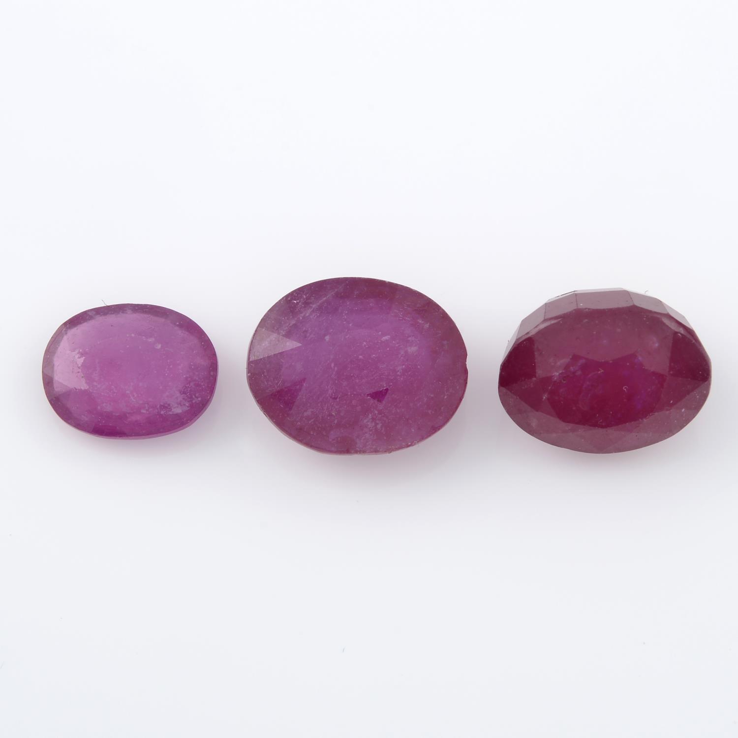 Three oval shape glass-filled rubies, weighing 32.58ct.