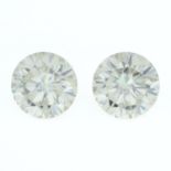 A pair of circular-shape synthetic moissanite, weighing 7.58cts total.