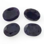 Nine oval-shape sapphires and an oval black star sapphire cabochon,