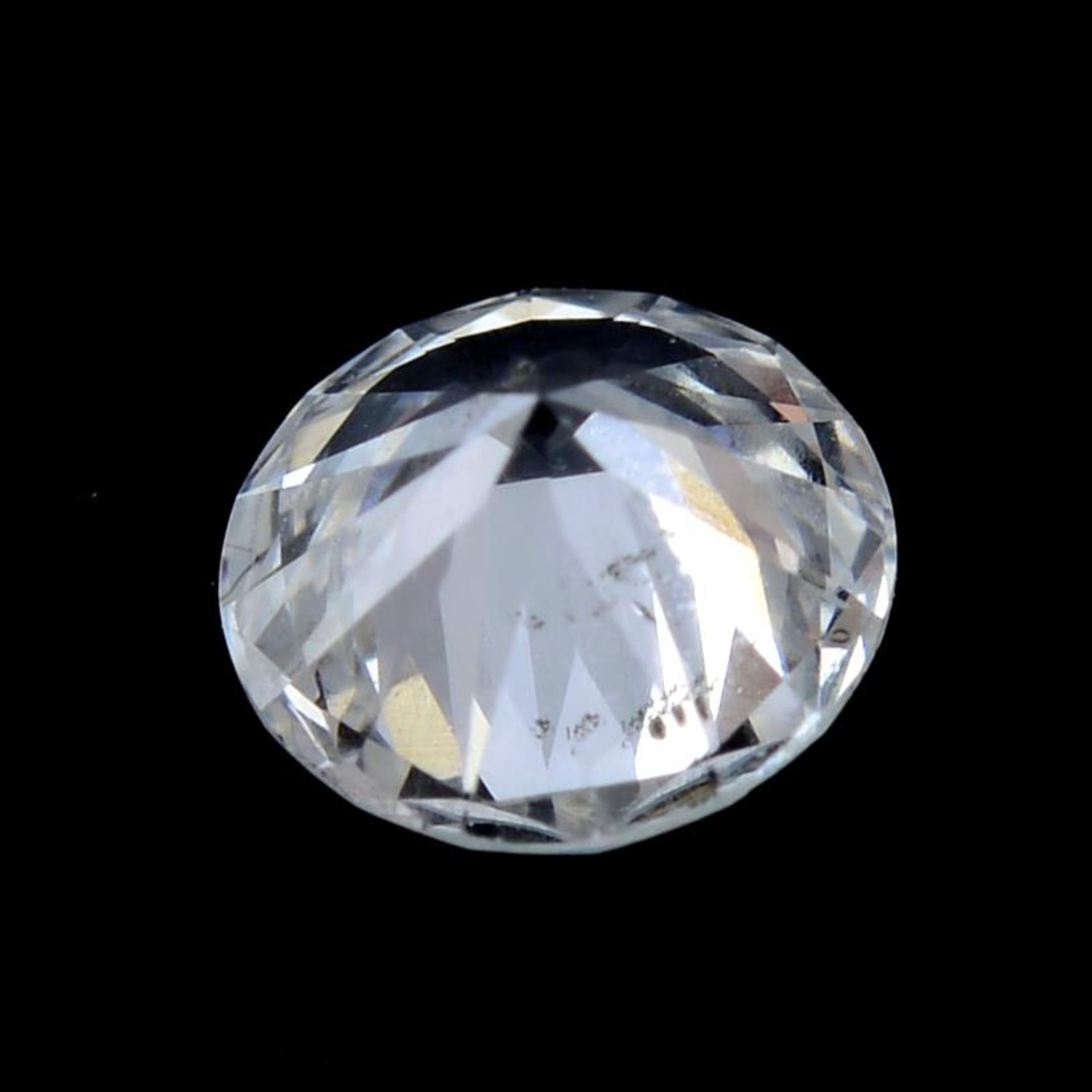 A brilliant cut diamond weighing 0.21ct. - Image 2 of 2