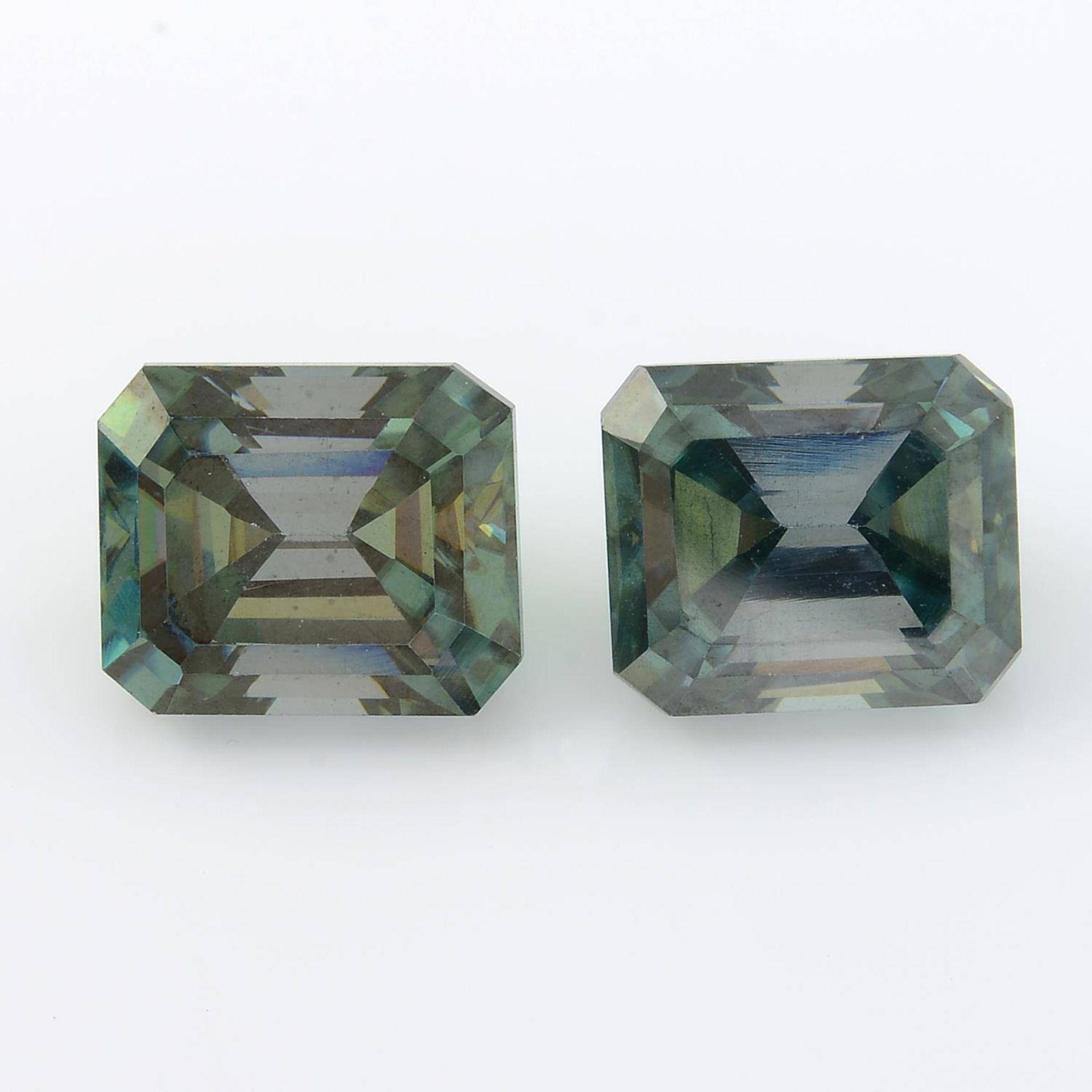A pair of rectangular-shape synthetic moissanites, total weight 5.16cts.