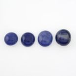 Four oval star sapphire cabochons.
