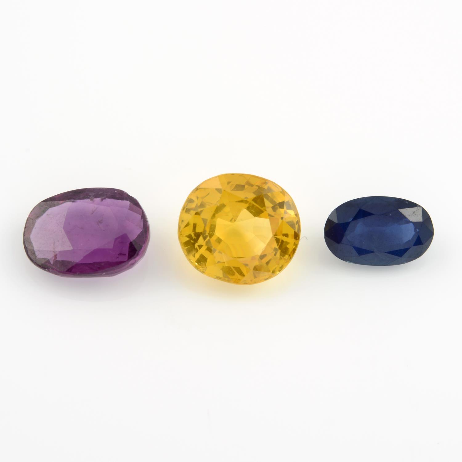 Selection of sapphires and an oval shape ruby Blue sapphires weighing 10.54ctYellow sapphire