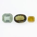 Three vari-shape gemstones,