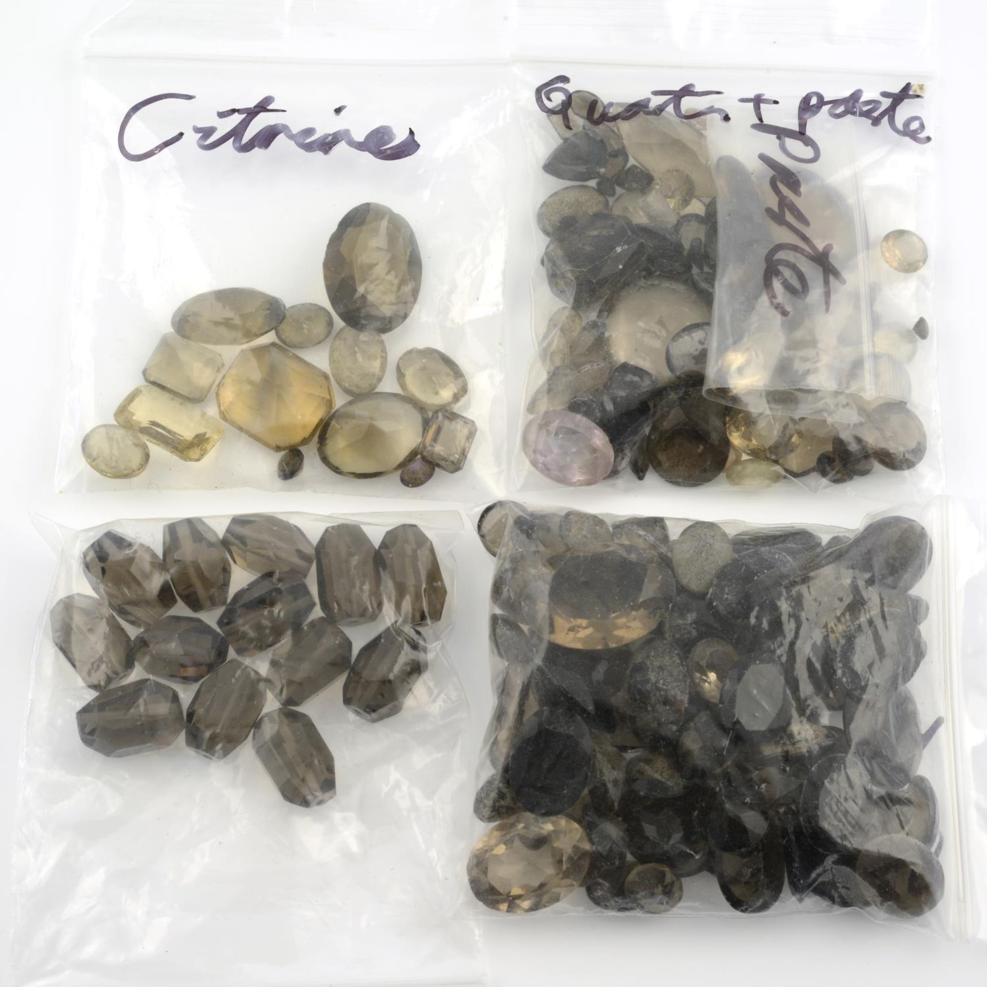 A selection of gemstones, to include predominantly smoky quartz, weighing 307gms. - Bild 2 aus 3