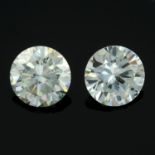 A pair of circular-shape colourless synthetic moissanite total 2.45cts.