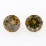 Pair of 'brown' diamonds, weighing 0.52ct total.