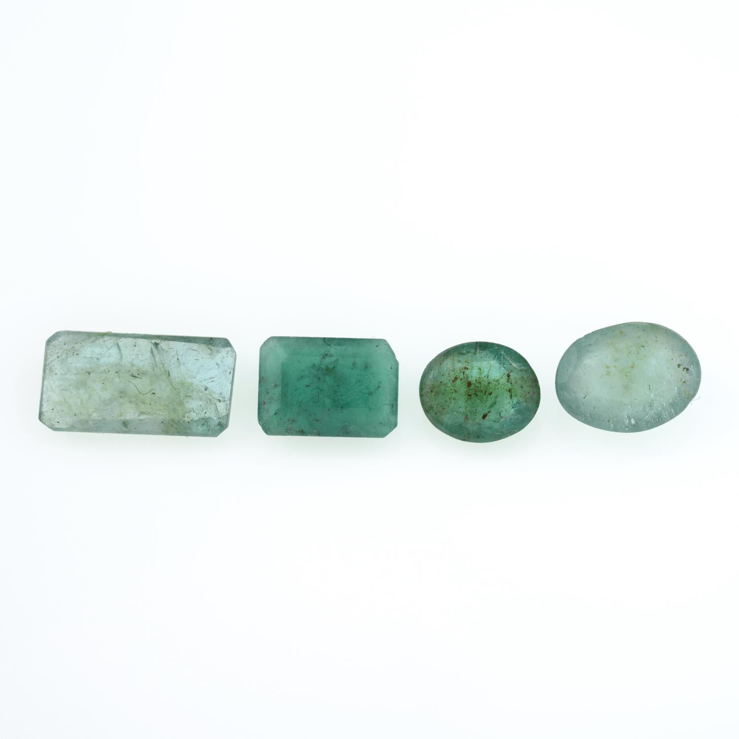 Four vari-shape emeralds,