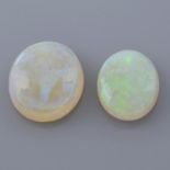 Three opals, weighing 10.11ct.