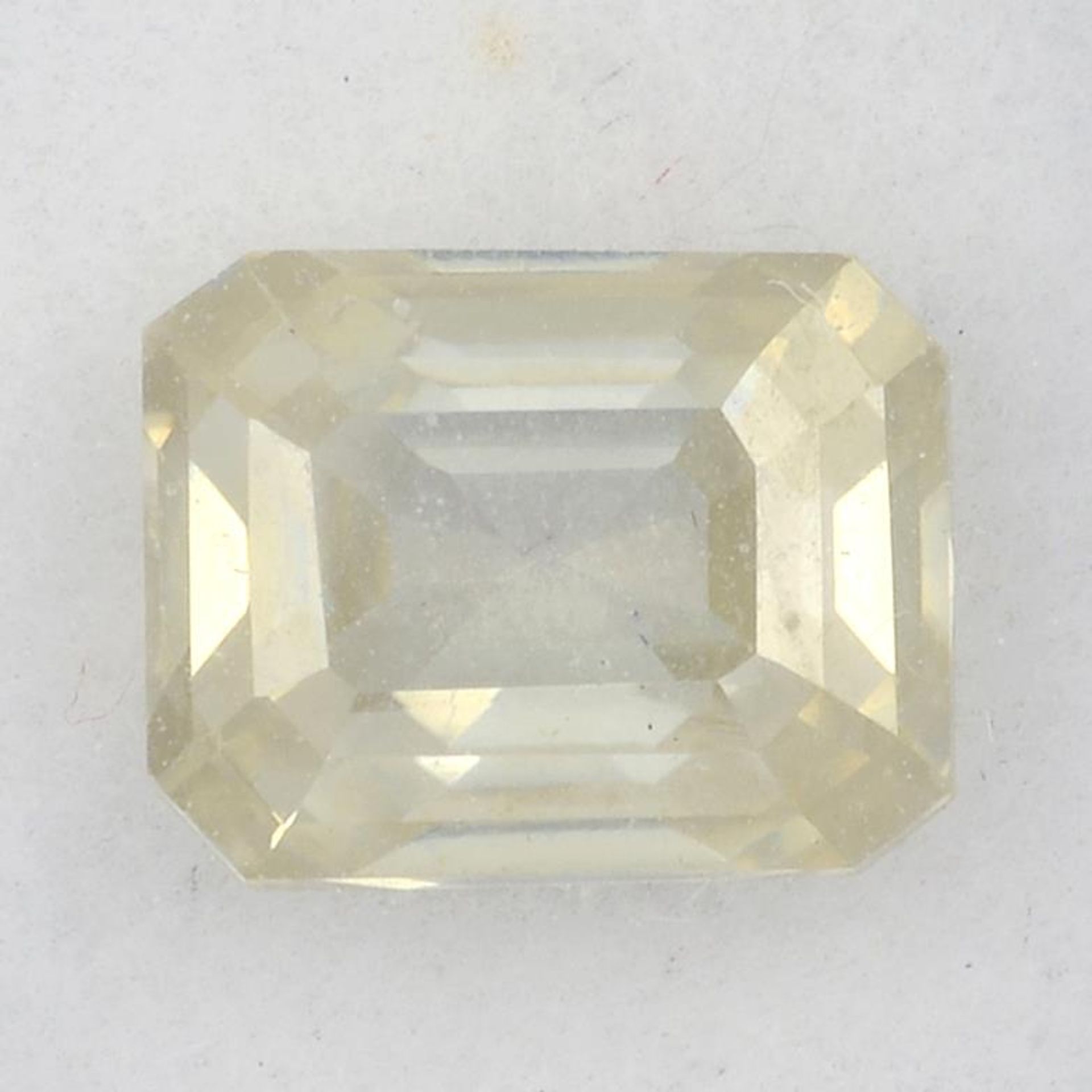 A rectangular-shape pale yellow synthetic moissanite, weighing 2.95cts.