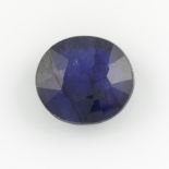 An oval-shape glass-filled sapphire.