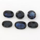 Six oval and circular-shape blue sapphires, total weight 6.59cts.