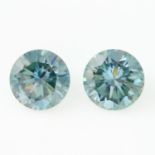 A pair of circular-shape green synthetic moissanites.