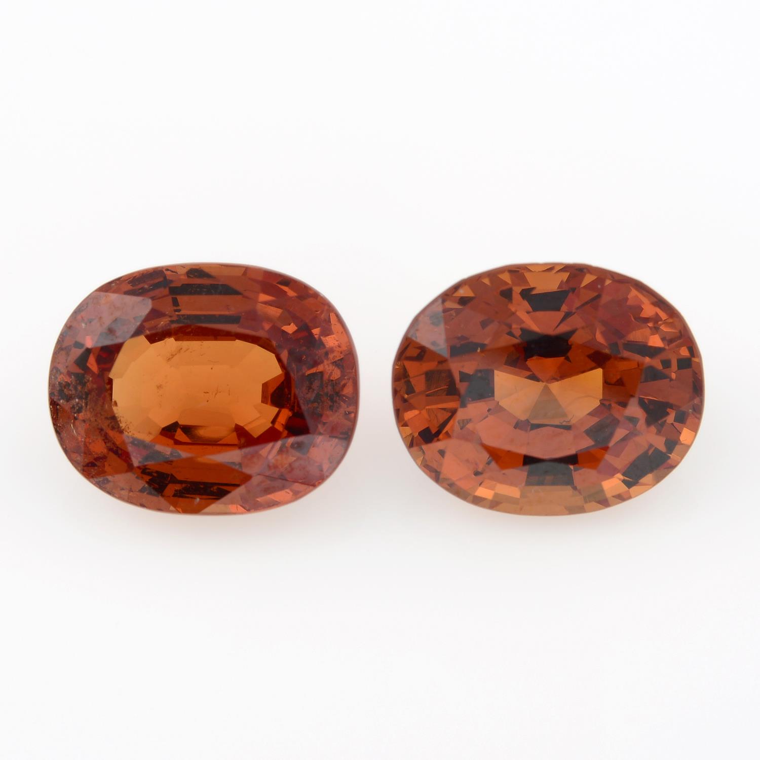 Two oval spessartite garnets, weighing 9.79ct.