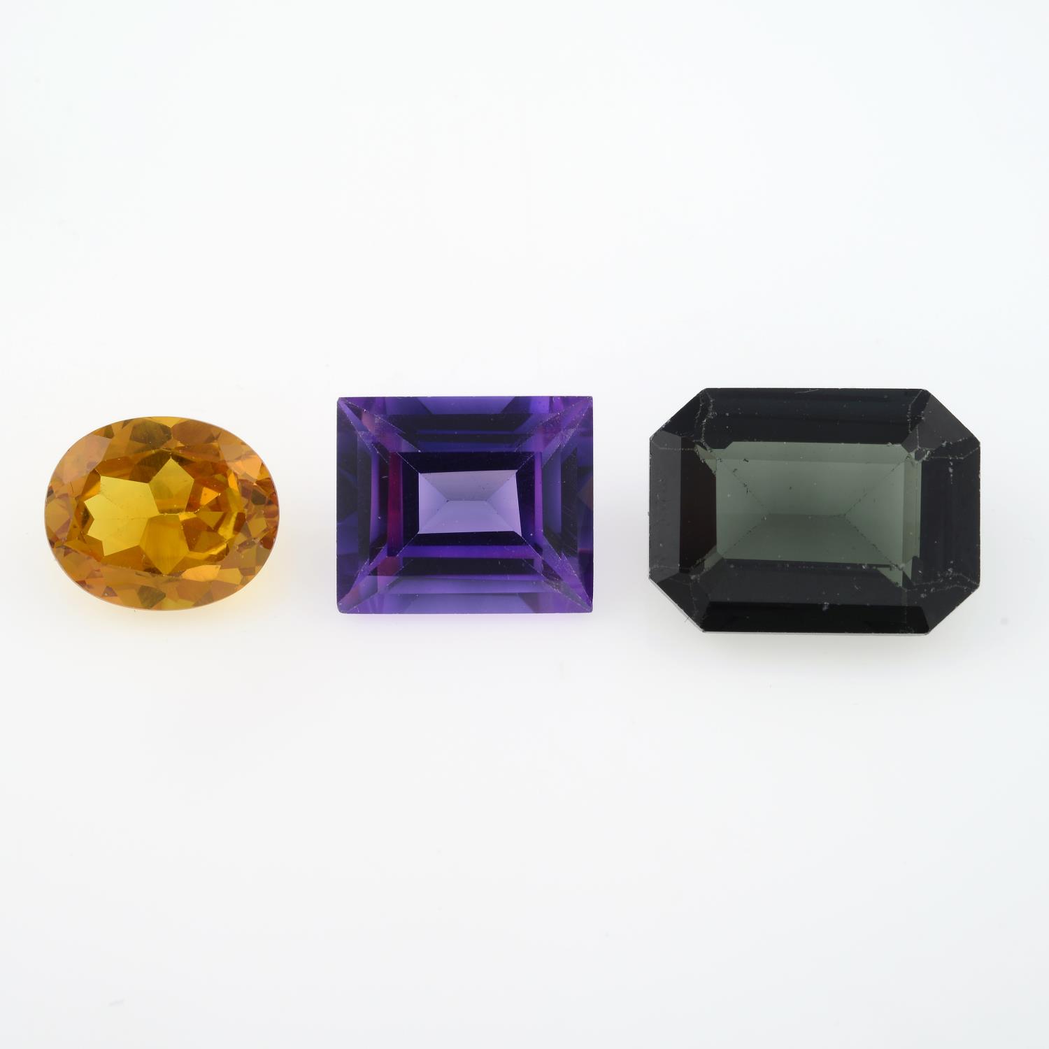 A selection of synthetic spinels and synthetic sapphires, weighing 189gms.