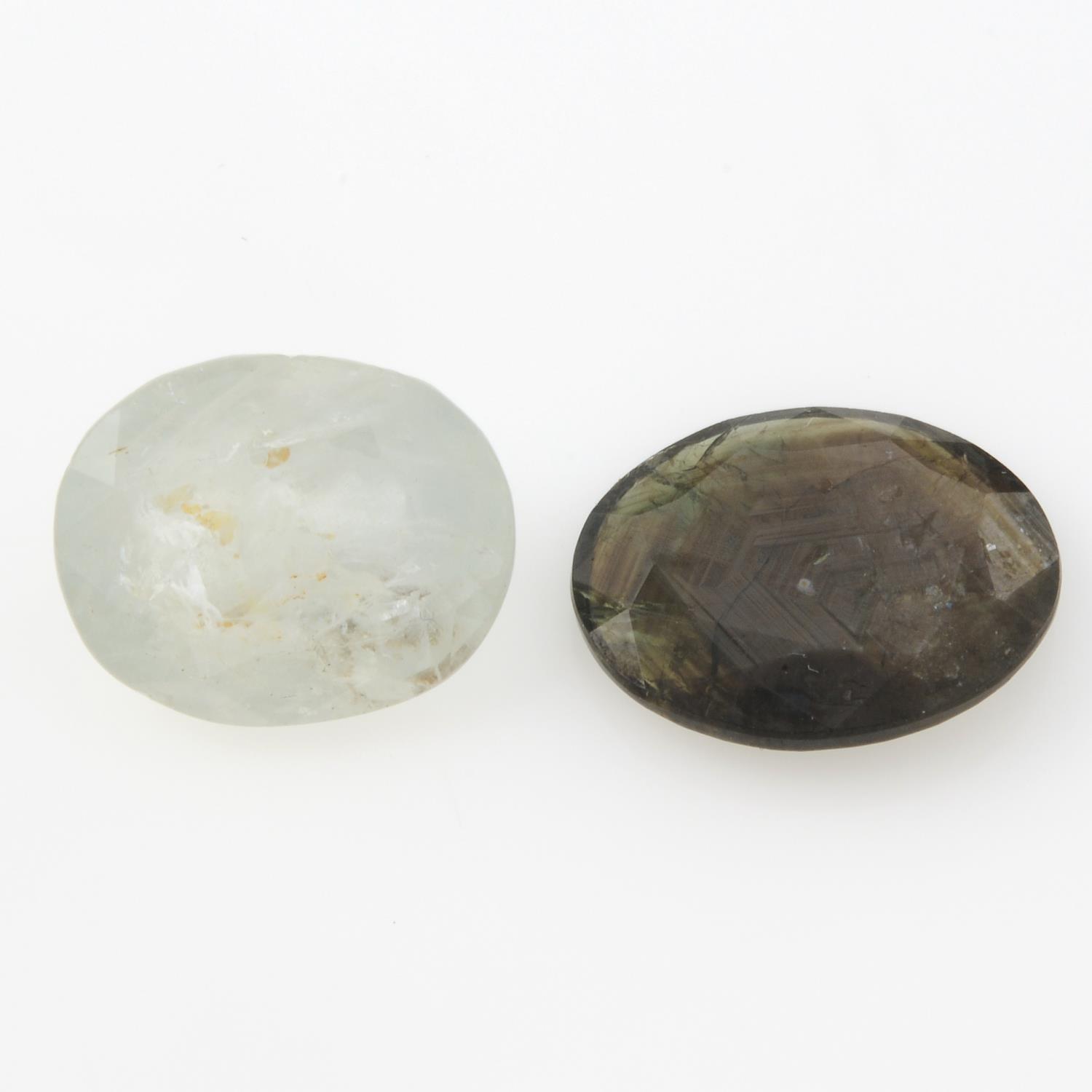 Two oval-shape sapphires.