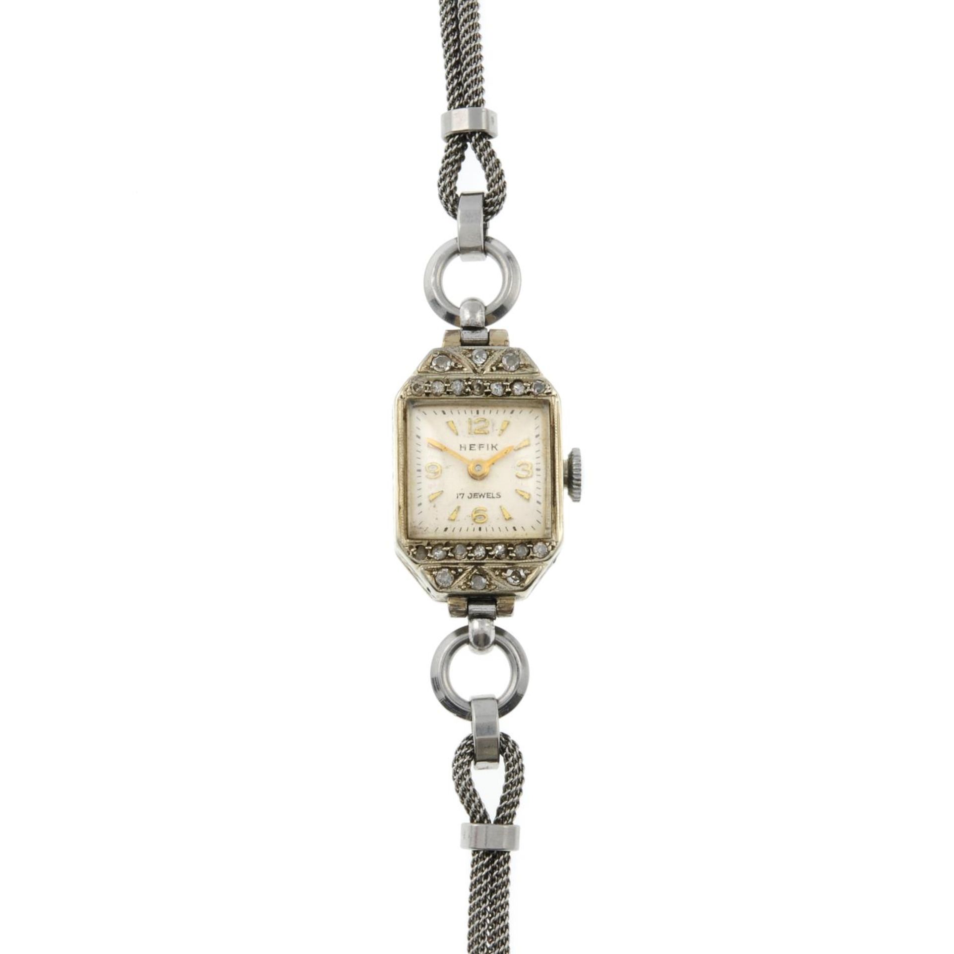 A Lady's diamond cocktail watch, by Hefik.Length 18cms.