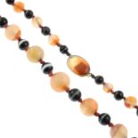 A banded agate necklace.Diameter of beads 0.6 to 1.5cms.
