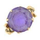 A 14ct gold synthetic colour-change sapphire ring.Stamped 14K.Ring size H.
