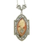 A shell cameo and diamond necklace.