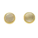 A pair of moonstone single-stone stud earrings.Stamped 750.Length 0.8cms.