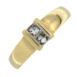 A 9ct gold square-cut diamond ring.Total diamond weight 0.25cts.Hallmarks for Birmingham.Ring size