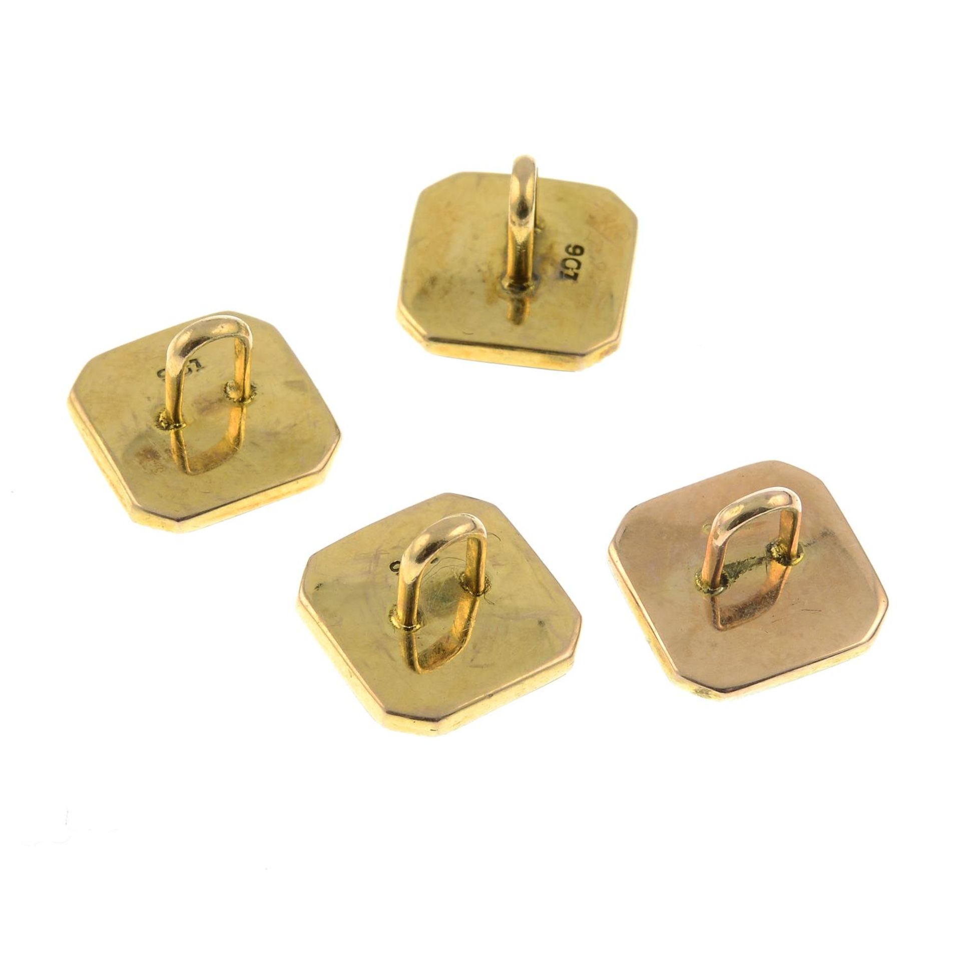 A set of four 9ct gold mother-of-pearl and enamel buttons.Stamped 9ct.Length 1cms. - Image 2 of 2