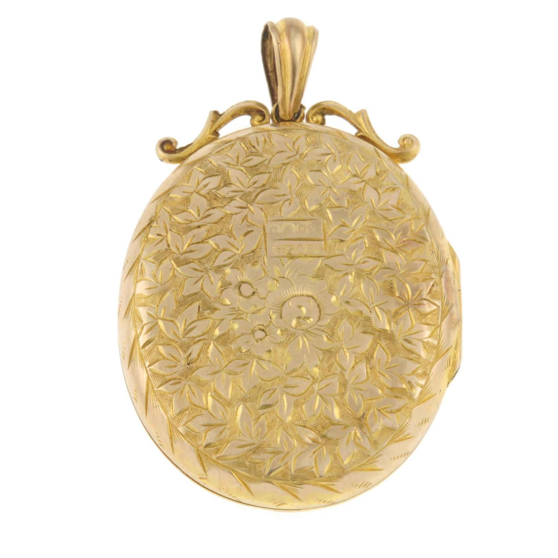 A 9ct gold engraved locket.Hallmarks for Birmingham, 1988.Length 4.4cms. - Image 2 of 3