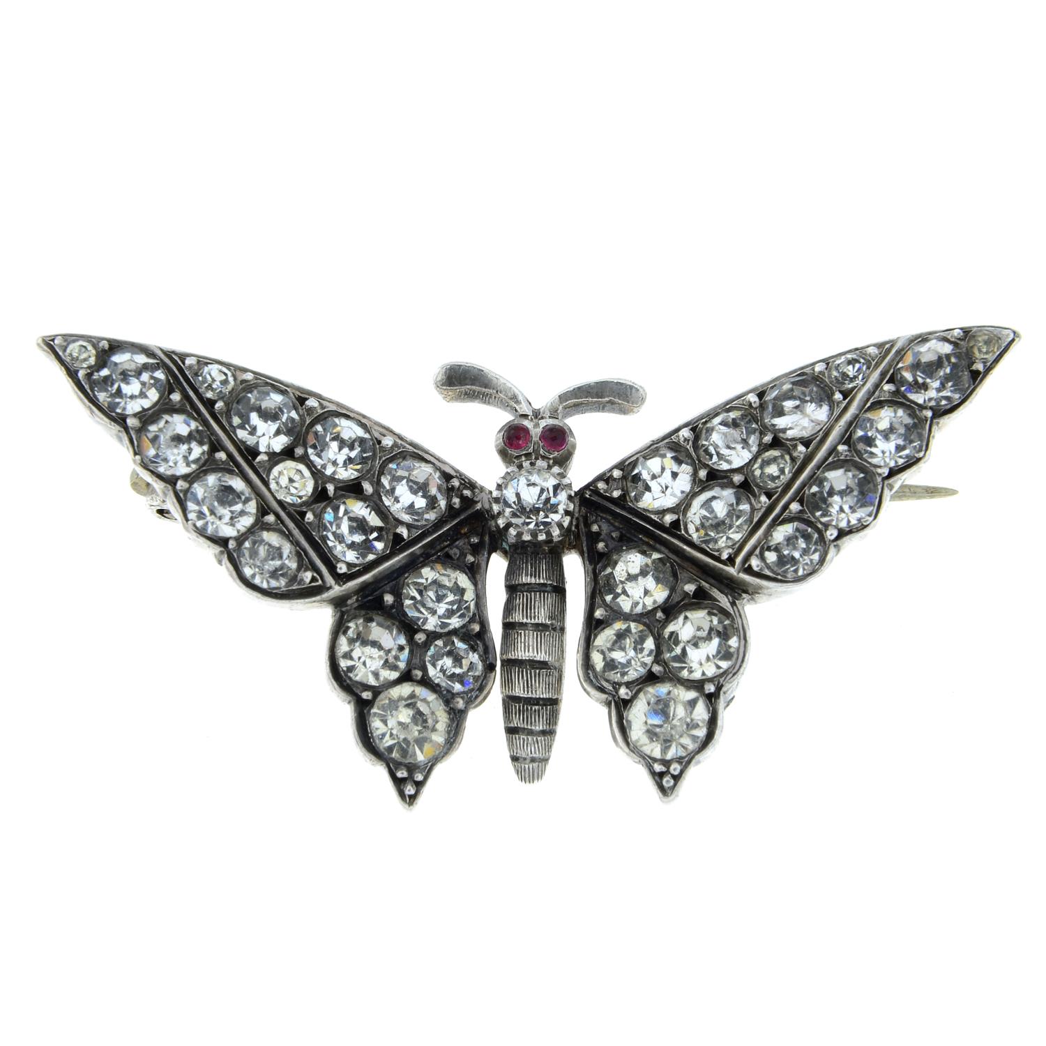 An early 20th century paste and garnet butterfly brooch.