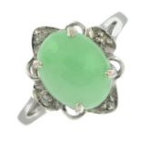A 14ct gold jade and diamond ring.Jade is untested.Hallmarks for Edinburgh.Ring size Q1/2.