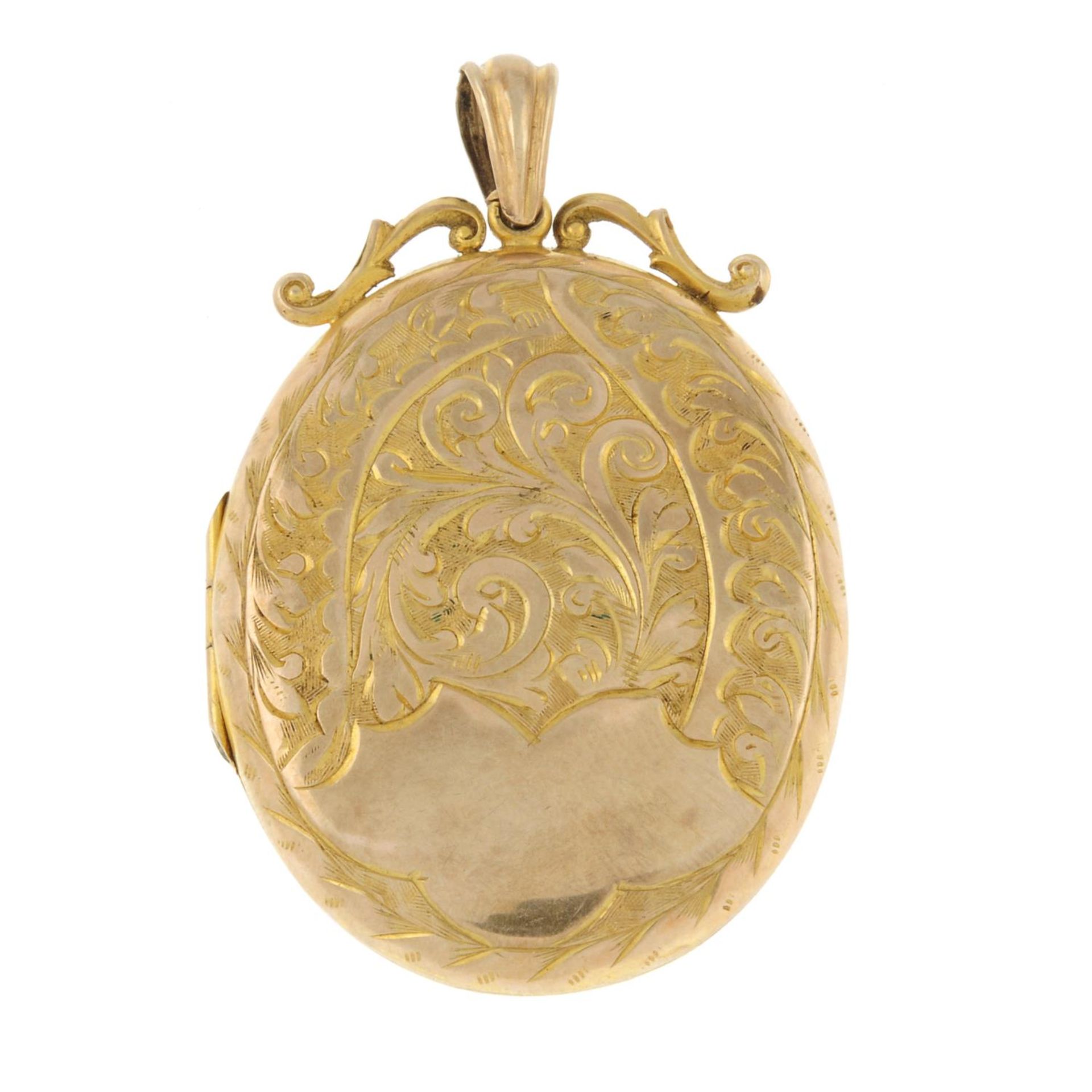 A 9ct gold engraved locket.Hallmarks for Birmingham, 1988.Length 4.4cms.